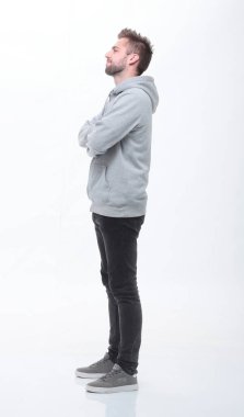 Yan görünüş. Fotokopi alanına bakan sıradan bir adam. beyaz üzerine izole