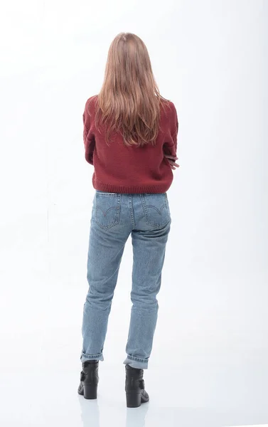 Vista trasera. estudiante chica de pie delante de blanco pantalla en blanco —  Fotos de Stock