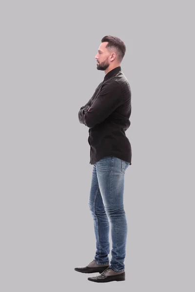 Vista lateral. jovem moderno em jeans — Fotografia de Stock