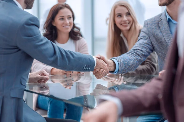 Close up. business people confirming the transaction by their handshake — Stock Photo, Image