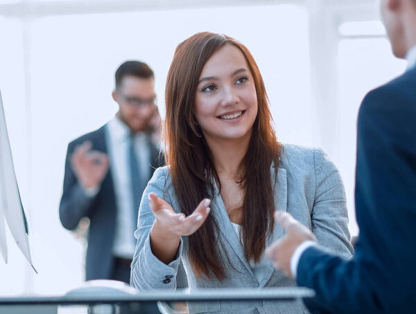 business woman shaking hands with a business partner.