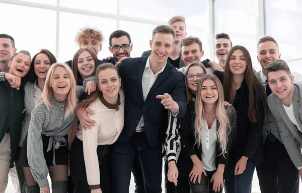 Group of cheerful young professionals looking at the camera — Stock Photo, Image