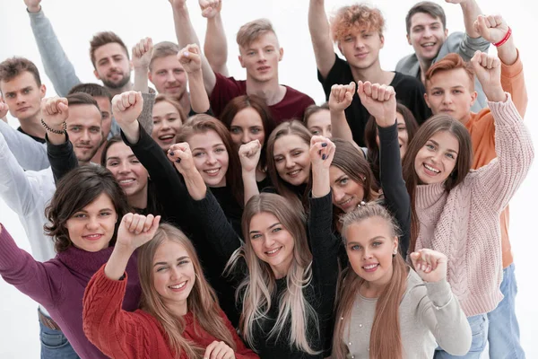 Grupo de jovens confiantes olhando para a câmera e mostrando seu sucesso — Fotografia de Stock