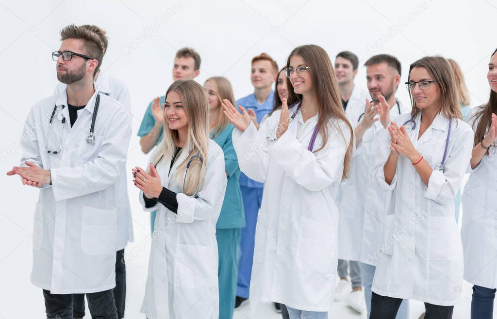 close up. hospital doctors applauding their success.