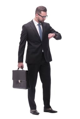 Tam boy. Yönetici işadamı kol saatine bakıyor.