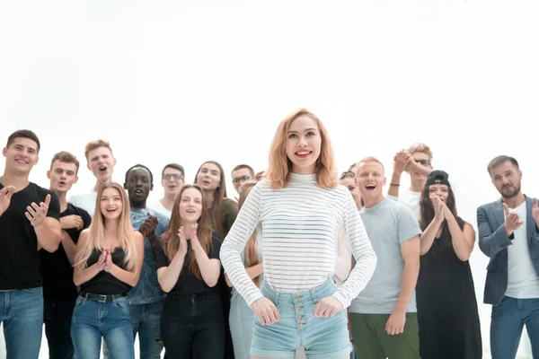 group of diverse young people applauding their leader