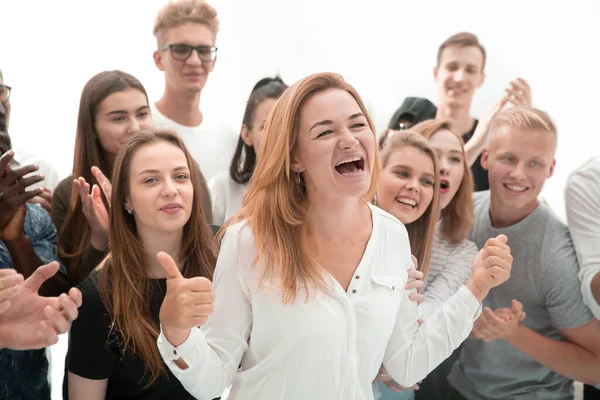 Grupa młodych ludzi wspierająca ich szczęśliwego lidera — Zdjęcie stockowe