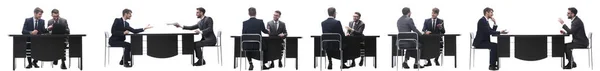 Бізнес-колеги обговорюють, що сидить за столом — стокове фото