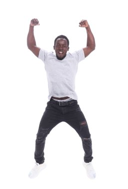 Tam gelişim. Kotlu ve tişörtlü yakışıklı adam.