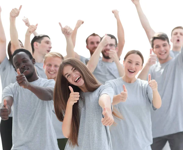 Groep van gelukkige jonge mensen tonen duimen omhoog. — Stockfoto