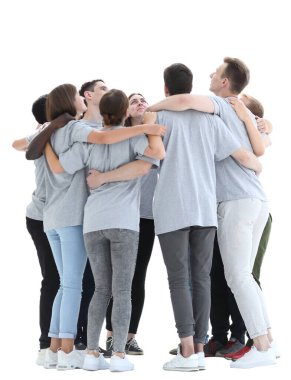 Tam gelişim. Çemberin içinde duran bir grup genç.