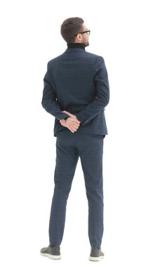 Dikiz aynası. İşadamı boş beyaz duvara bakıyor.