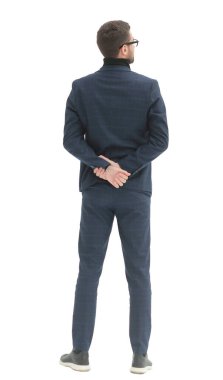 Dikiz aynası. İşadamı boş beyaz duvara bakıyor.