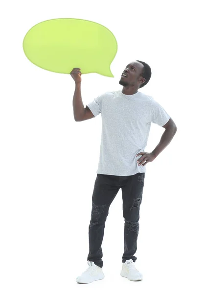 In full growth. handsome guy looking at blank speech bubble — Stok fotoğraf