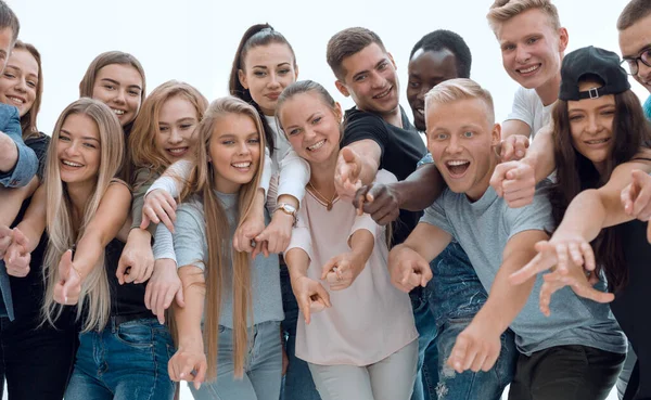 Group of young people together pointing at something — Stock Photo, Image