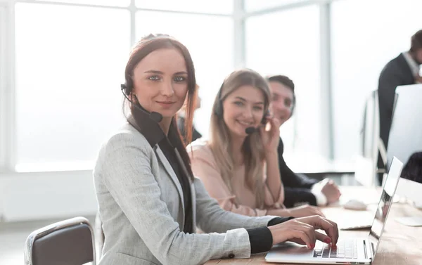 Young woman working in a call center team. — Stock Photo, Image
