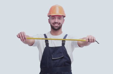 Tam gelişim. İnşaat mezurası olan adam geliştirici