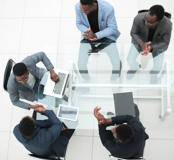 Business partners shaking hands during negotiations in the office. — Stock Photo, Image