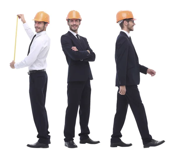 In full growth .a qualified architect in an orange helmet — Stock Photo, Image