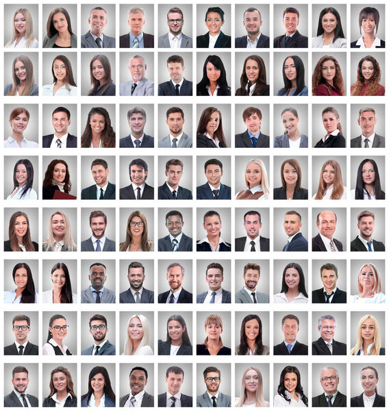 portraits of a group of successful employees isolated on white