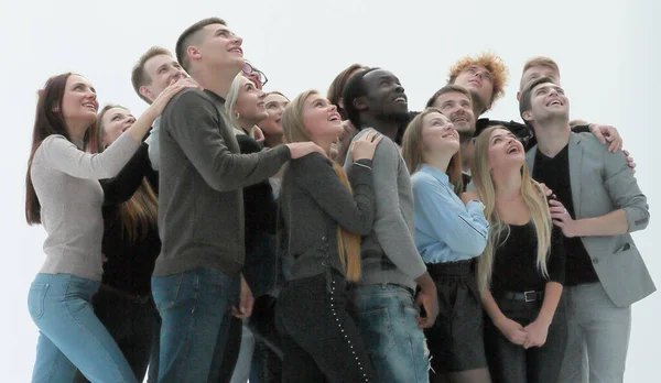 Grupo de jovens apontando para cima. isolado em branco — Fotografia de Stock