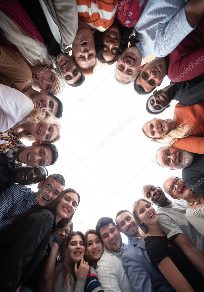 Group of happy international people standing in circle