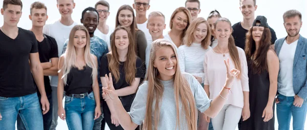 Girl leader standing in front of her associates — Stock Photo, Image