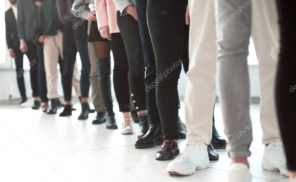 close up. group of young professionals standing in line