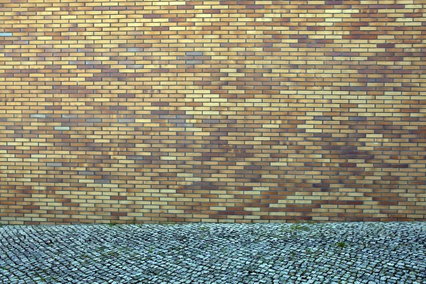 Cihlová zeď, stavební plochy fasády jako městské pozadí — Stock fotografie