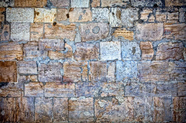 Parte di un muro di pietra. Sfondo o texture — Foto Stock