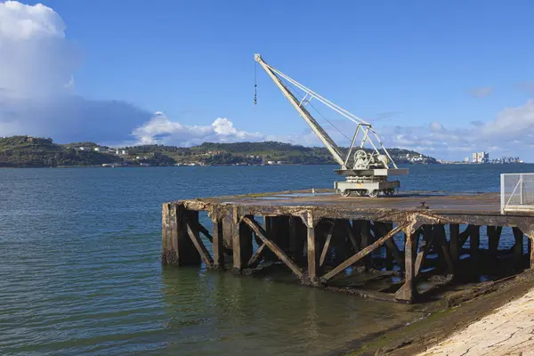 A old pier on the river in Lisbon — Stock Photo, Image