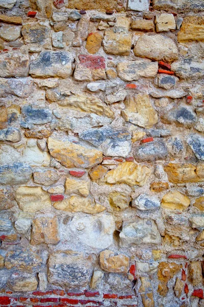 Parte de un muro de piedra. Fondo o textura — Foto de Stock