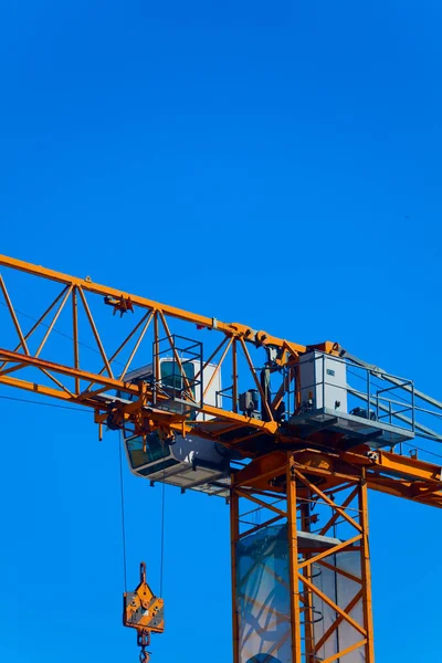 Part construction crane with blue sky background — Stock Photo, Image