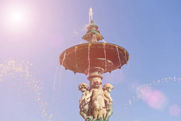 Sculptures at  fountain in Rossio Square, Lisbon, Portugal — Stock Photo, Image