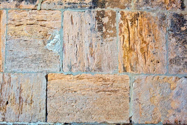 Parte de un muro de piedra. Fondo o textura — Foto de Stock