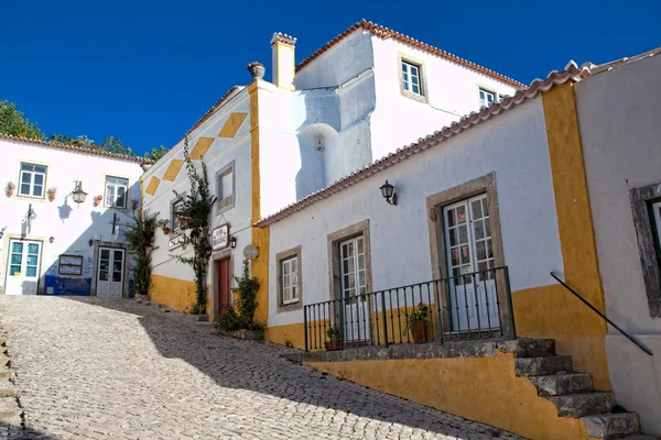 Narrow street in the medieval Portuguese City of Obidos — Stock Photo, Image