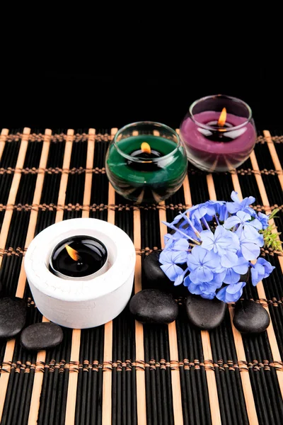 Aromatherapy. spa candles on a black background — Stock Photo, Image