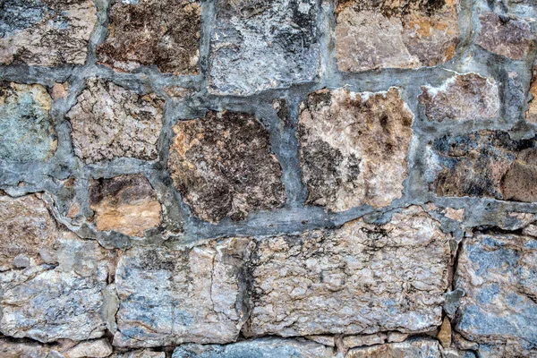 Parte de una pared de piedra, para fondo o textura — Foto de Stock