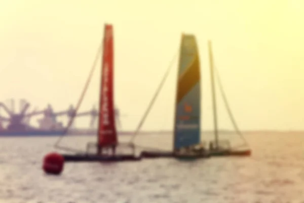 Yachten eine Segelregatta auf dem Meer bei Sonnenuntergang. verschwommenes Imag — Stockfoto