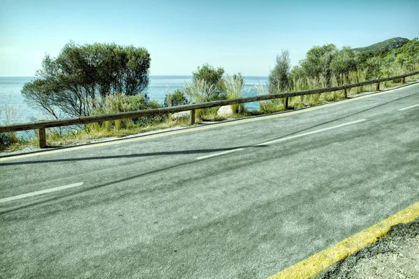 Empty two lane asphalt road highway vanishing in perspective — Stock Photo, Image