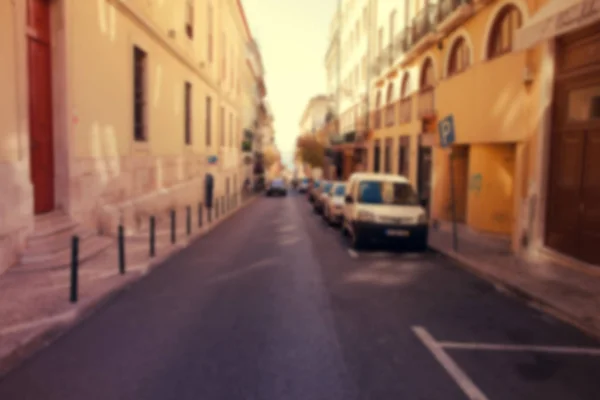 Street in the historical city center at sunset time. Blurred  im — Stock Photo, Image