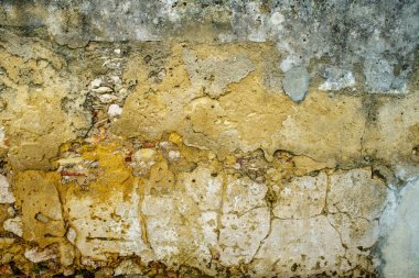 taş duvar, kil sıva ile kaplı. Vintage mimari panoramik arka plan