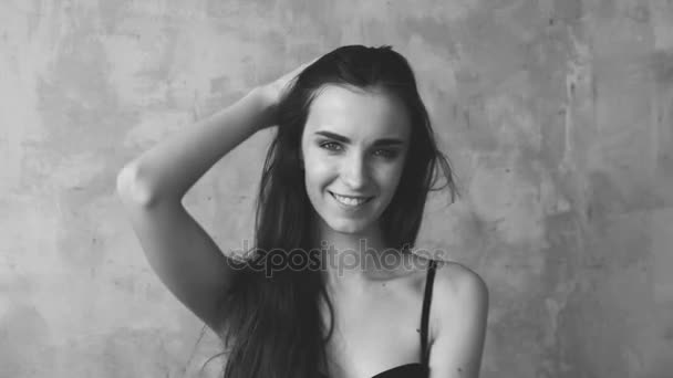 Professional fashion model posing and looking into camera. Woman show poses and emotions closeup — Stock Video