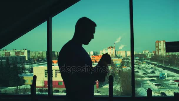 Silhouette sporty man have rest and drink protein cocktail in fitness club and gym center — Stock Video