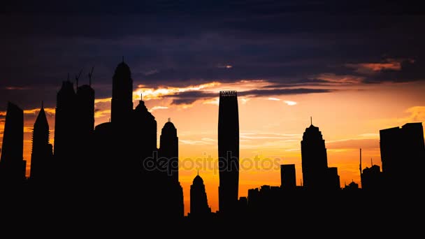 Timelapse de Dubai marina silueta de paisaje urbano en la puesta de sol en los Emiratos Árabes Unidos — Vídeos de Stock
