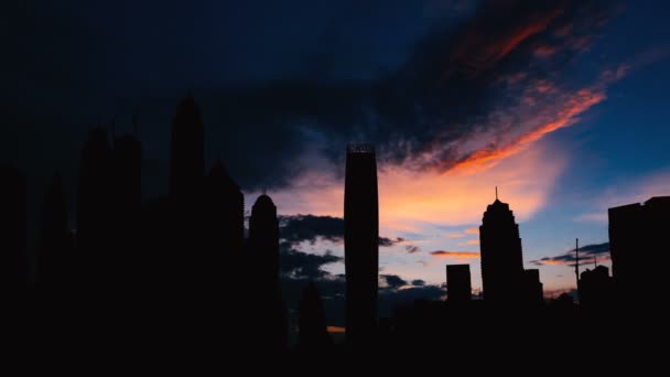 Timelapse of Dubai marina cityscape silhouette on sunset in UAE — Stock Video