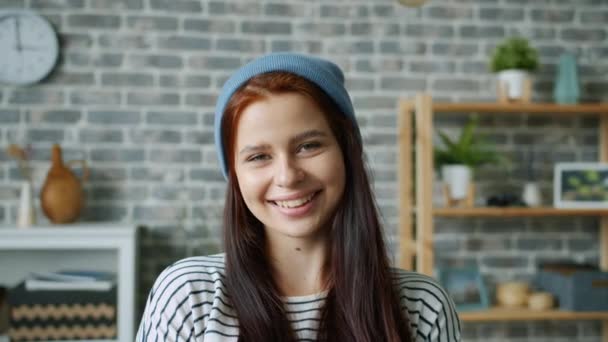 Portrait of good-looking young woman flirting smiling standing in apartment — ストック動画