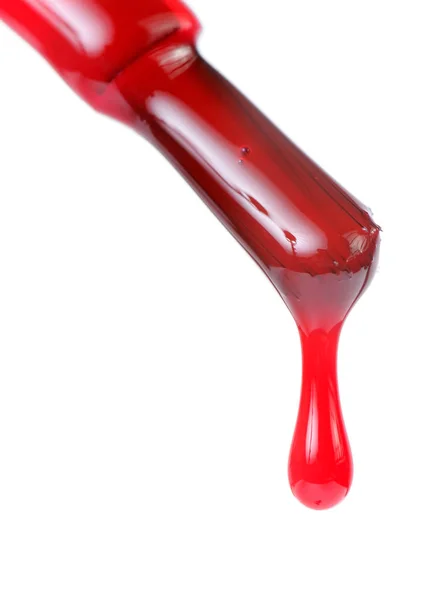 Verniz de prego vermelho em branco — Fotografia de Stock