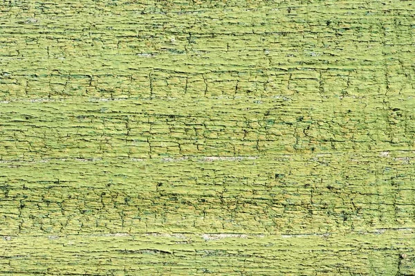 绿色油漆剥落在木板上 — 图库照片
