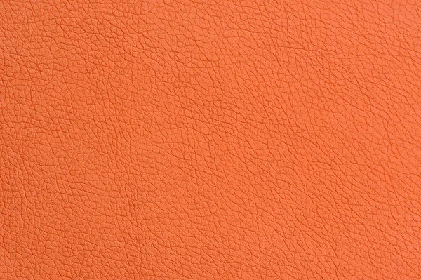 Textura de fundo de couro artificial laranja close-up — Fotografia de Stock